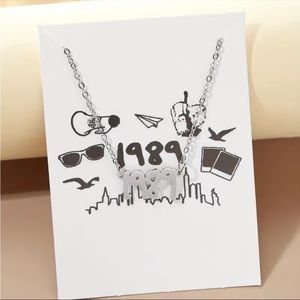 TAYLOR SWIFT 1989 stainless steel silver tone necklace new NWT eras swifie